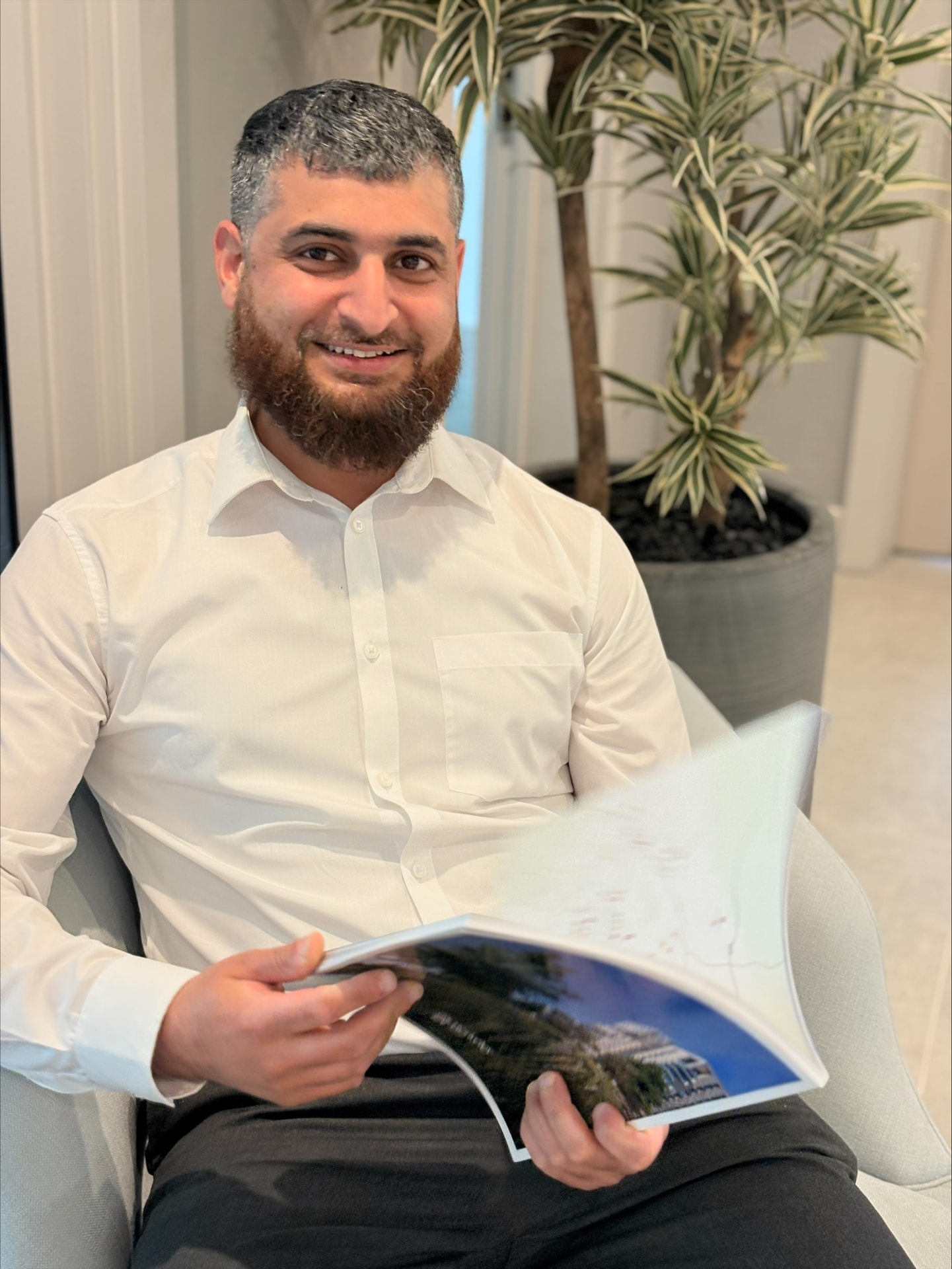 Naeem Yaqoob reviewing client accounts